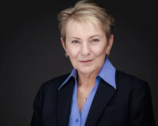 Professional studio headshot of Debbie Brittingham — captured by Eric Cathell Photography