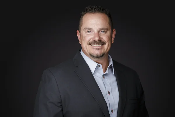 Mitch Brittingham's studio headshot portrait — photographed by Eric Cathell Photography